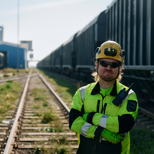 A woman in Nurminen Logistics clothing